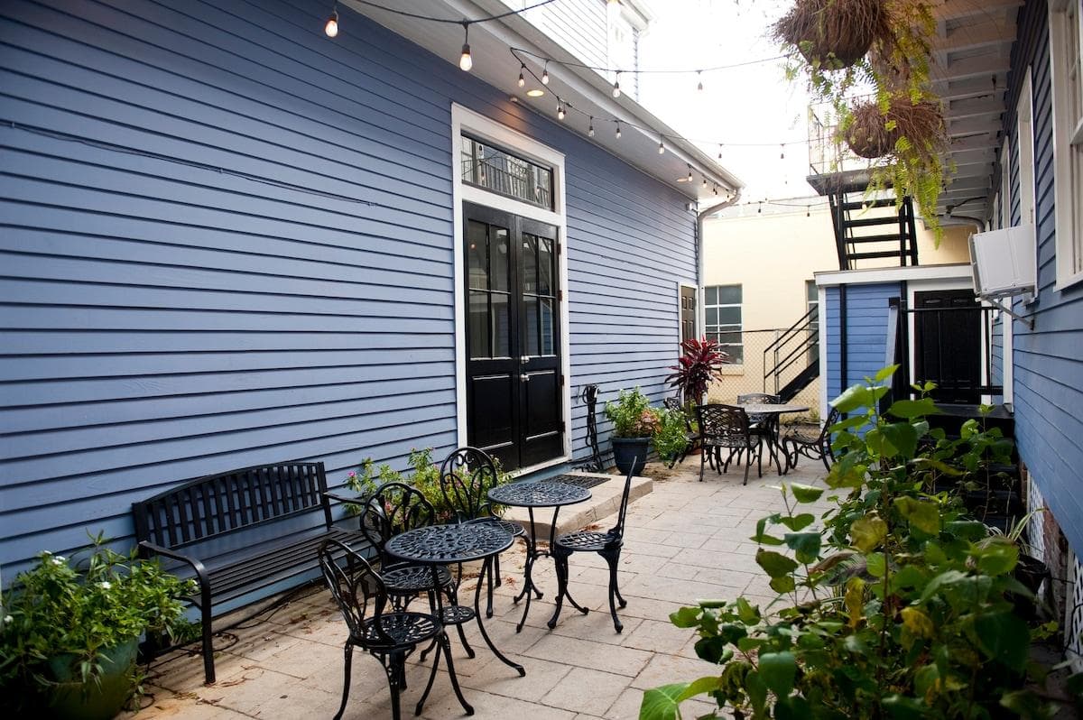 The inviting shared courtyard, lush with plants.