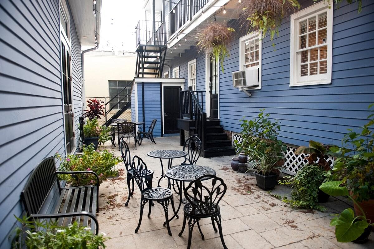 The inviting shared courtyard, lush with plants.